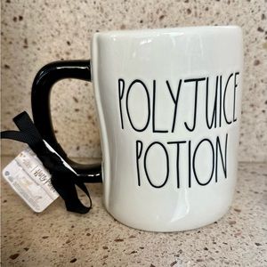 Rae Dunn Harry Potter collection Polyjuice Potion mug in white.